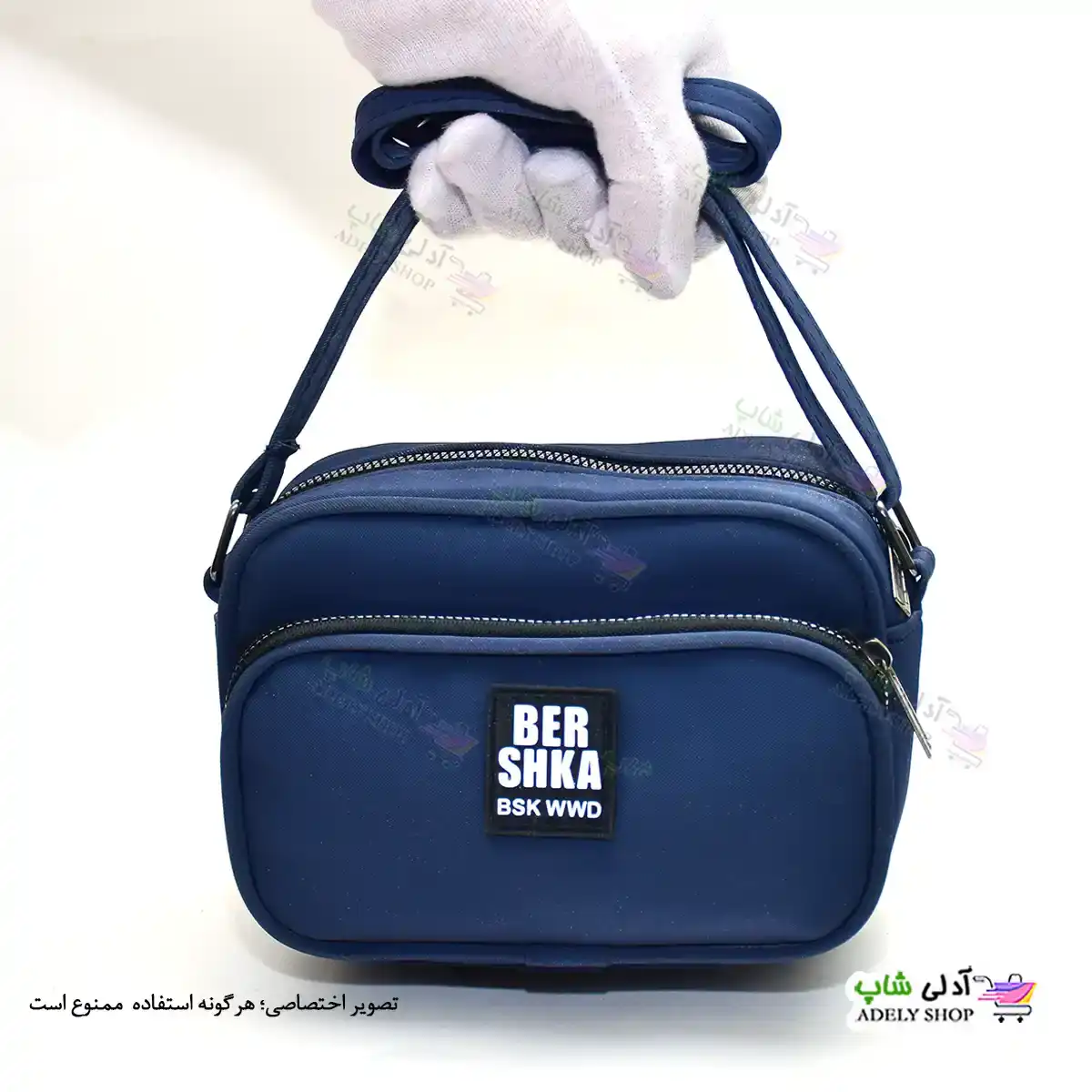 تصویر کیف پاسپورتی دوشی زنانه و دخترانه برشکا جلو زیپ