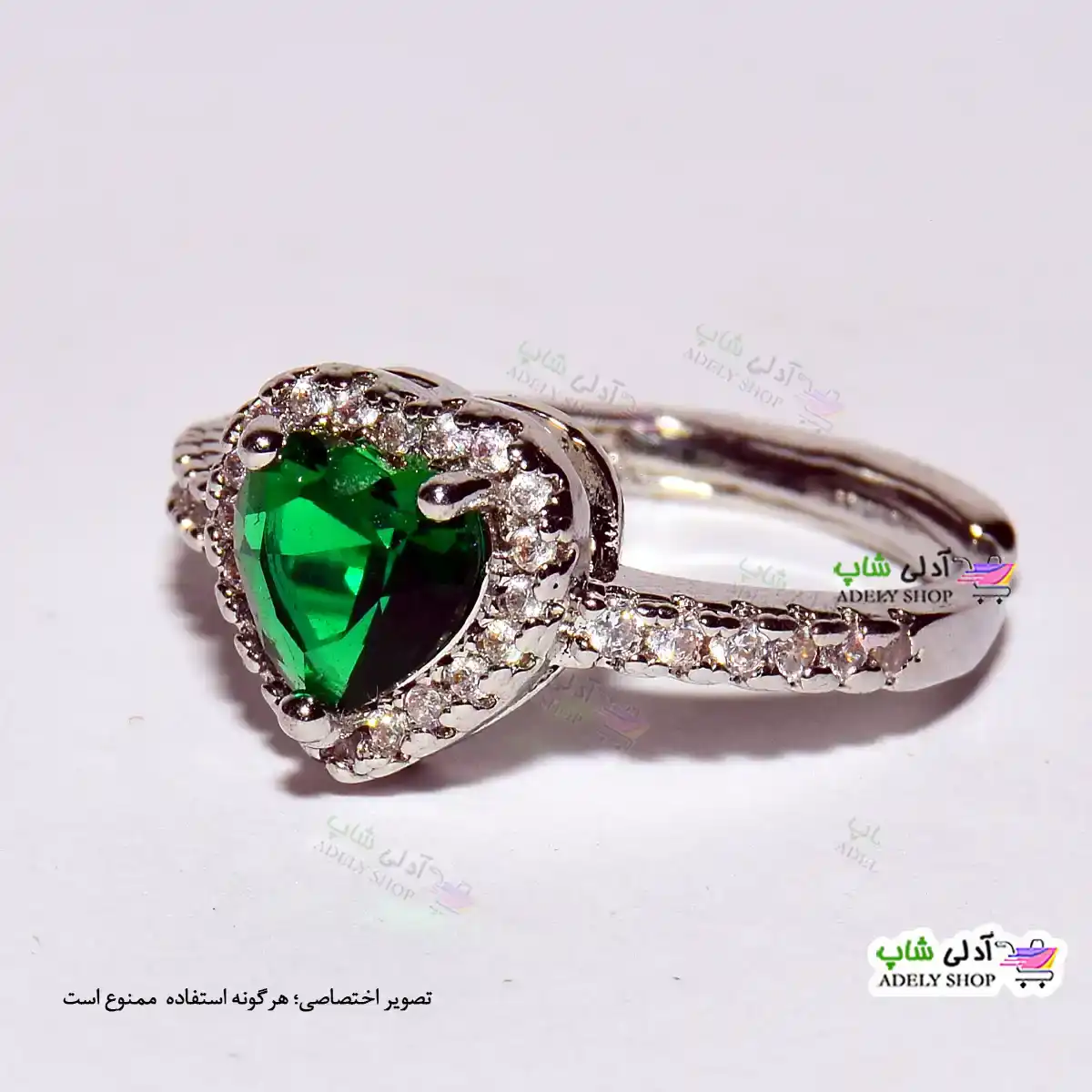 تصویر انگشتر فری سایز استیل با نگین قلبی سبز