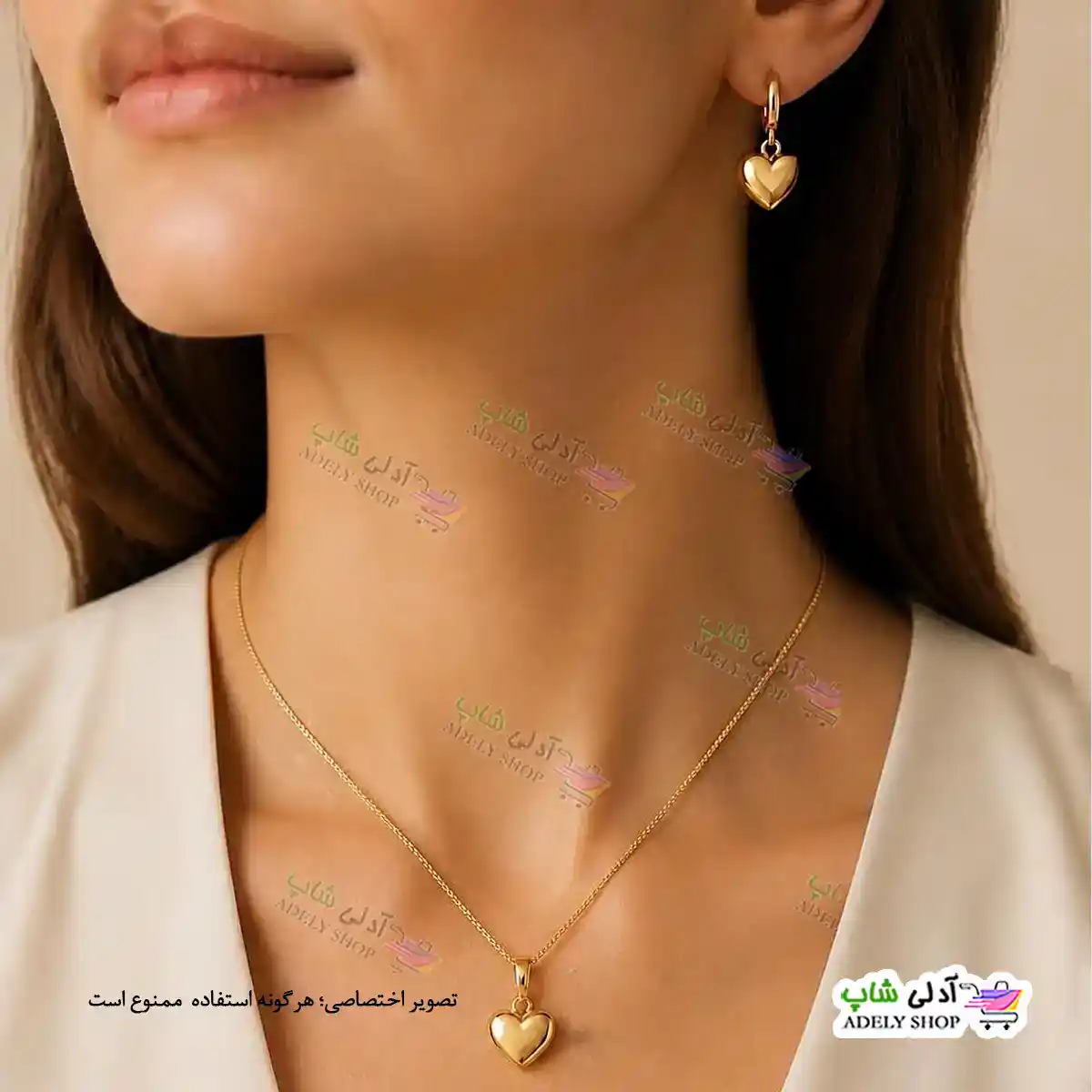 تصویر نیم ست گوشواره و آویز قلبی ژوپینگ با آبکاری طلا