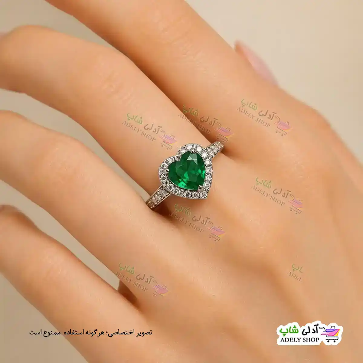 تصویر انگشتر فری سایز استیل با نگین قلبی سبز