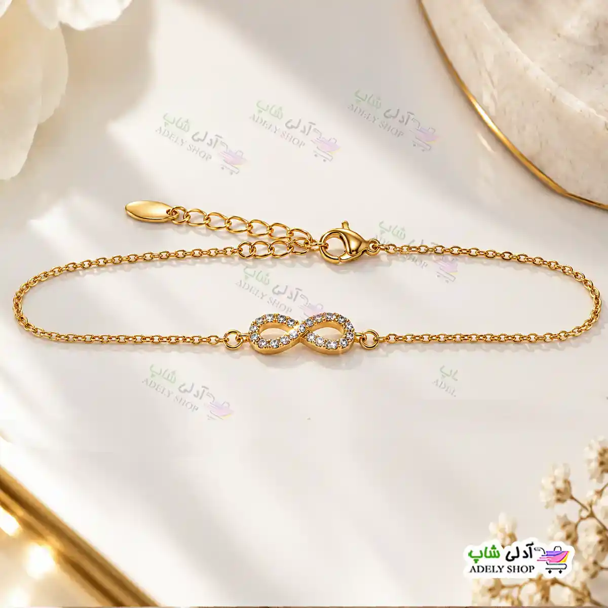 تصویر دستبند نگین دار ژوپینگ طرح بینهایت با آبکاری طلا