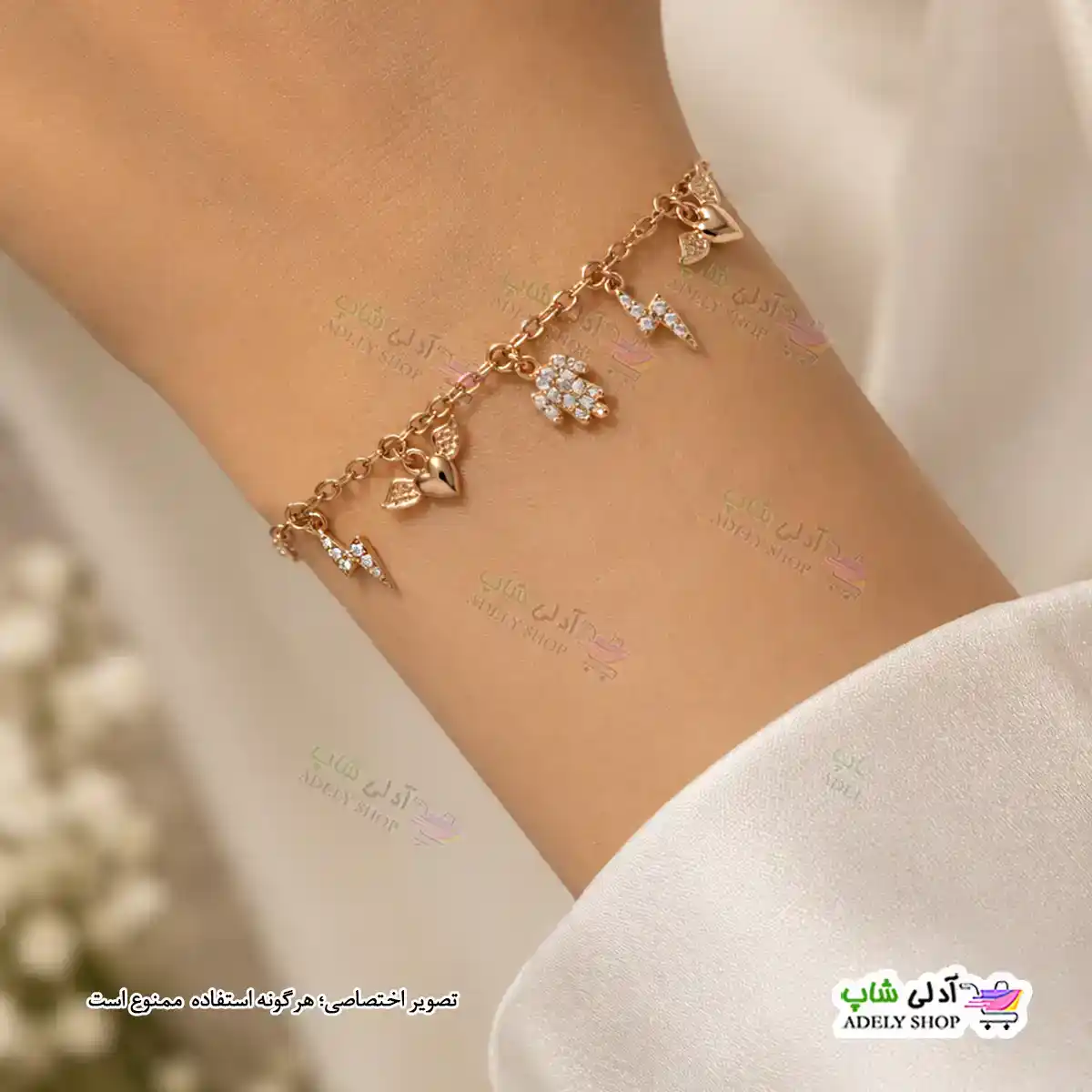 تصویر دستبند نگین دار ژوپینگ رنگ ثابت با آبکاری طلا