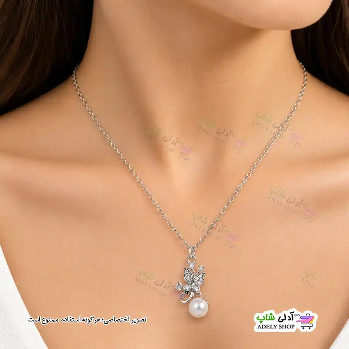 تصویر گردنبند طرح پروانه و مروارید
