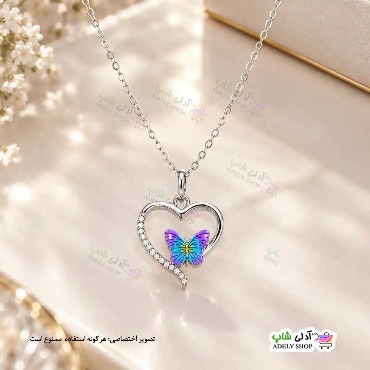 تصویر گردنبند نگین دار طرح قلب و پروانه