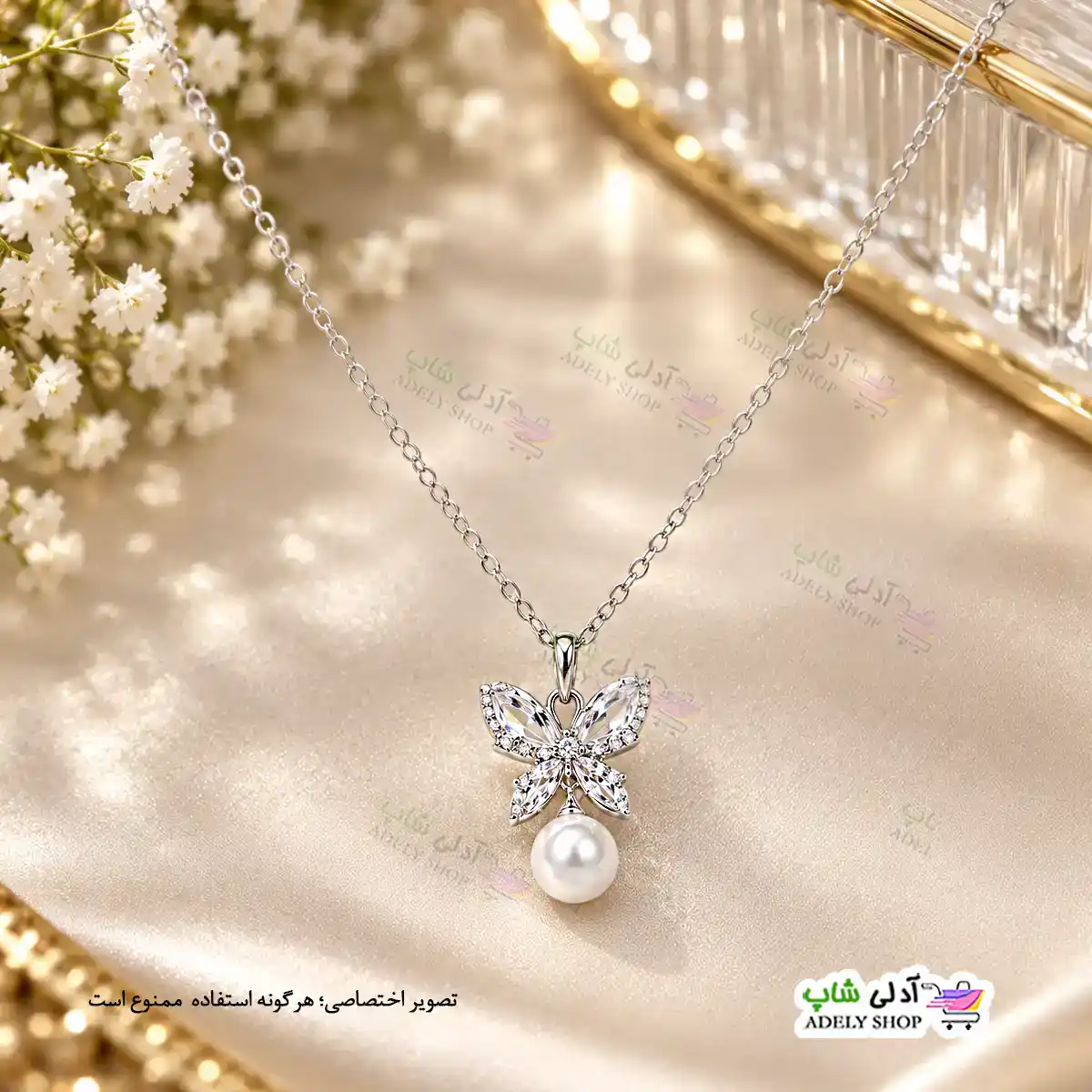 تصویر گردنبند نگین دار طرح پروانه و مروارید