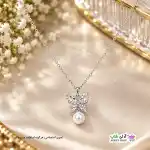 تصویر گردنبند نگین دار طرح پروانه و مروارید