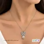 تصویر گردنبند نگین دار طرح پروانه و مروارید