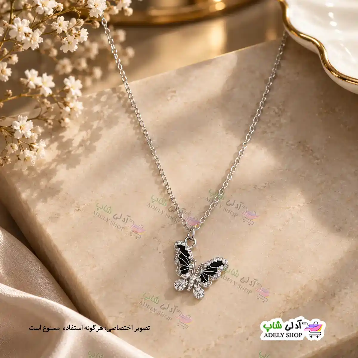 تصویر گردنبند طرح پروانه